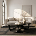 Sculptural Solid Wood Coffee Table with Curved Open Base in Black finish