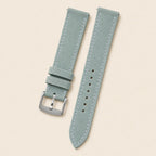 Blue Suede Leather Watch Strap leather watch strap, flat lay