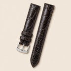 Chocolate Ostrich Leather Watch Strap leather watch strap, flat lay
