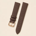 Chocolate Togo Leather Watch Strap leather watch strap, flat lay