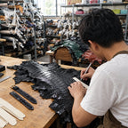 Selecting and cutting the leather in our Saigon workshop
