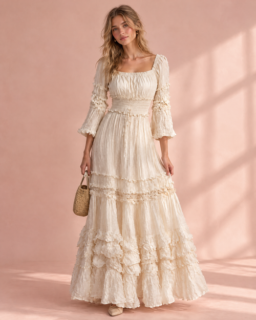 Ivory prairie maxi dress with smocked waist and layered ruffles