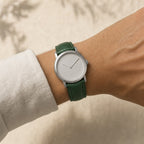 Patina Green Beaver Tail Leather Watch Strap worn on the wrist
